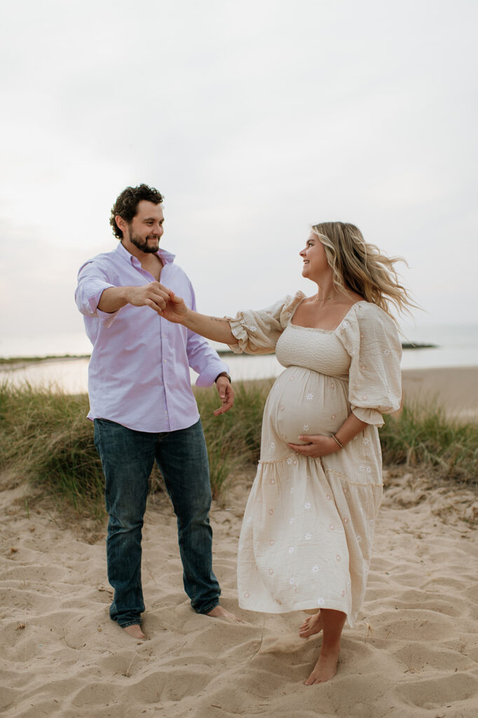 Man and woman dancing on the beach