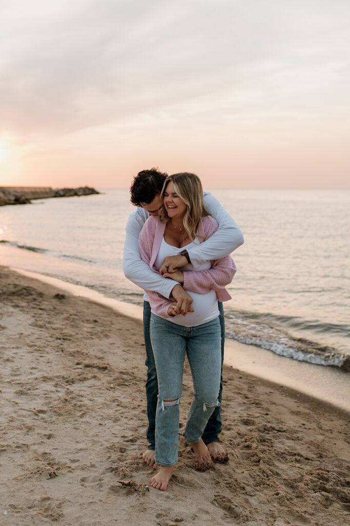 Couple being playful on the beach