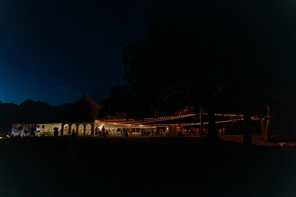 A tented backyard wedding reception in Culver, Indiana