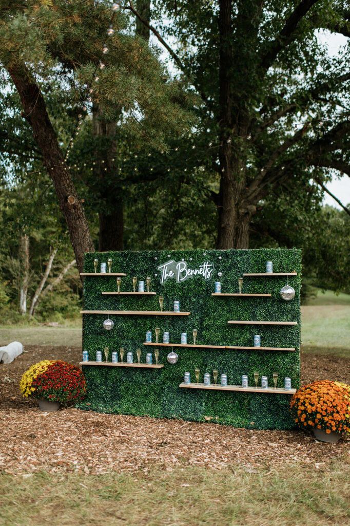 Champagne and beer wall for a backyard wedding reception in Culver, Indiana