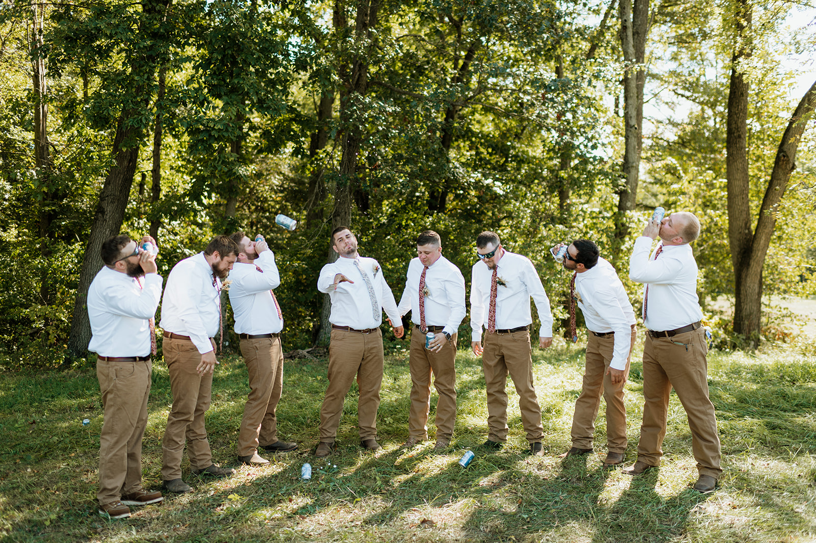 Outdoor groom and groomsmen portraits from a fall backyard wedding in Culver, Indiana