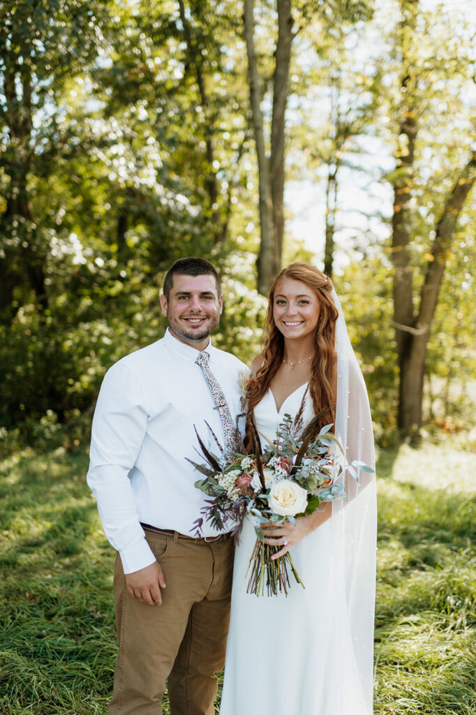 Outdoor bride and grooms portraits from their fall backyard wedding in Culver, Indiana