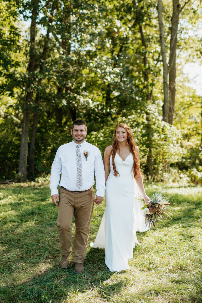 Outdoor bride and grooms portraits from a fall backyard wedding in Culver, Indiana