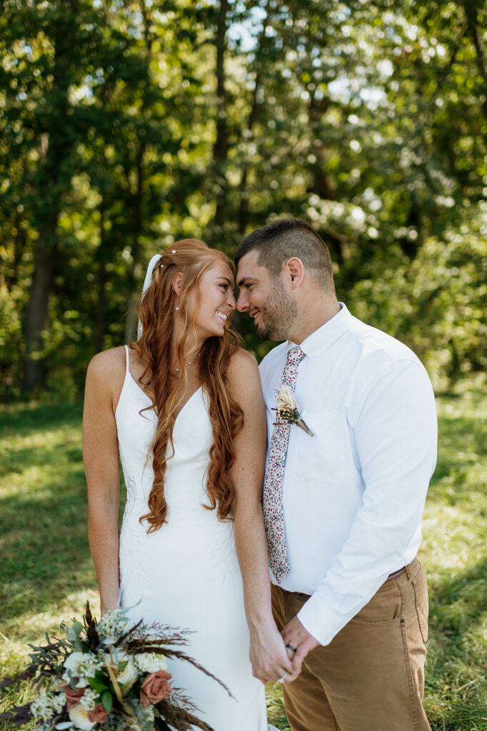 Outdoor bride and grooms portraits from a fall backyard wedding in Culver, Indiana