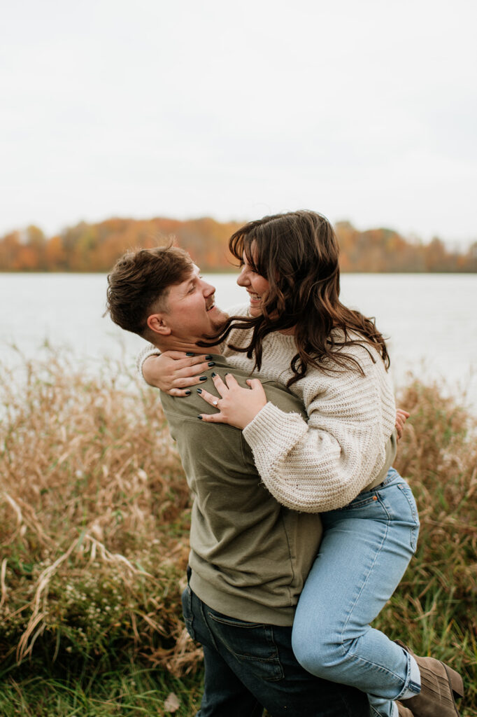 Couples playful Northern Indiana engagement photos at Potato Creek State Park in North Liberty