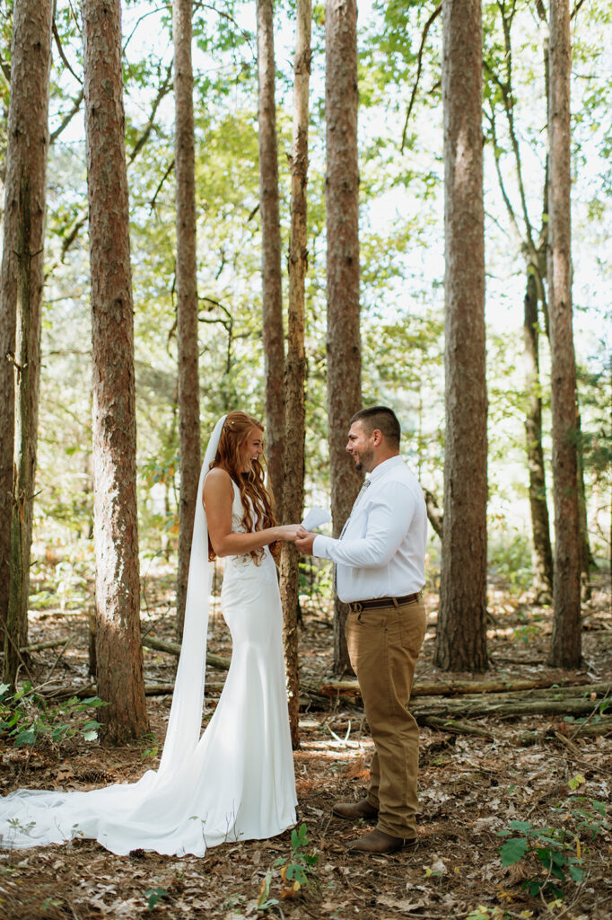 Bride and groom sharing private vows after their first look