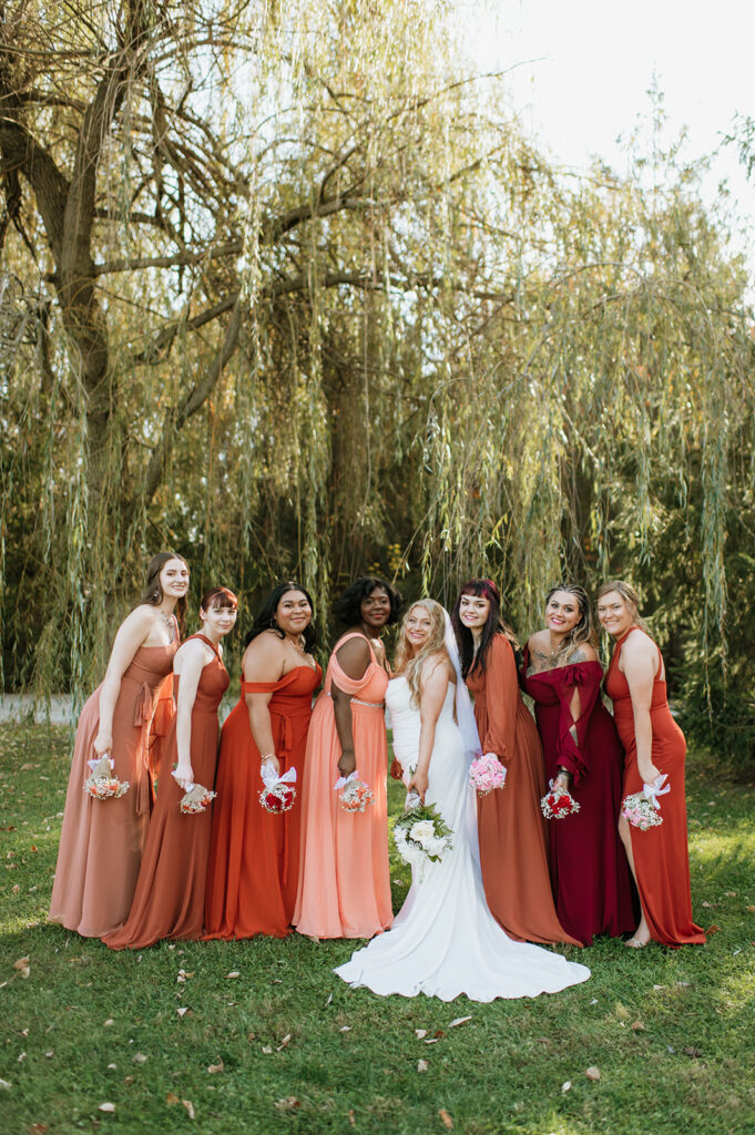 Outdoor bride and bridesmaids portraits from a Willow Acres wedding in Middletown, Indiana