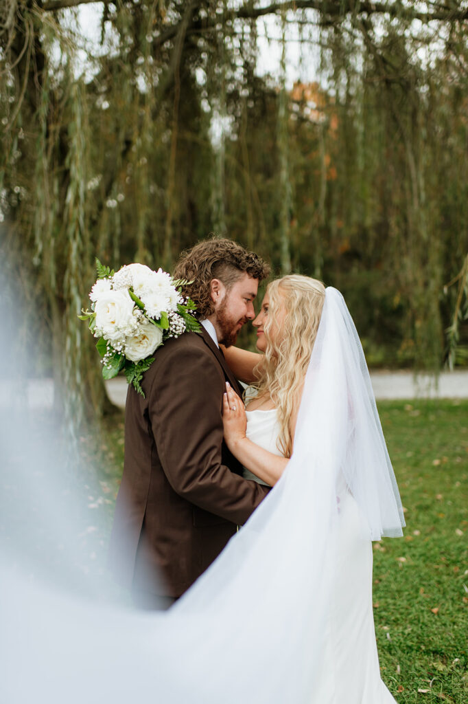 Outdoor fall bride and grooms portraits from their Willow Acres wedding in Middletown, Indiana