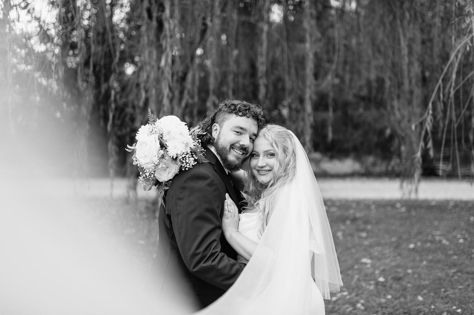 Black and white photo of a bride and groom