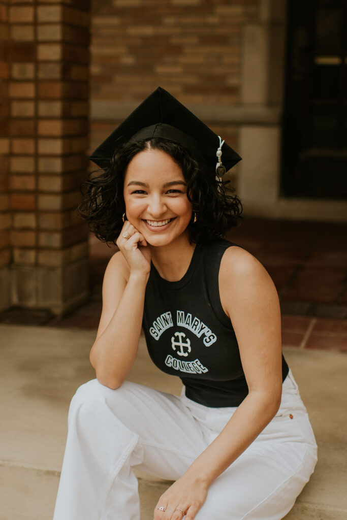 Women posing for her grad photos