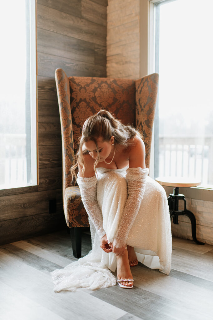 Bride getting ready for her winter wedding at The Allure on The Lake