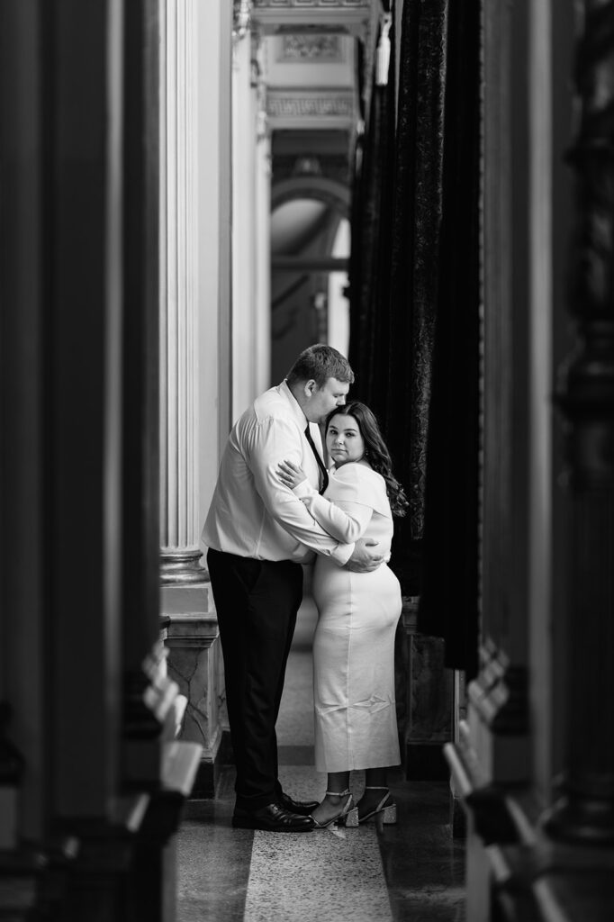 Couple posing for their South Bend engagement photos at Morris Performing Arts Center 