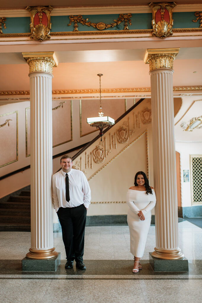 Couple posing at The Morris Performing Arts Center for their engagement session
