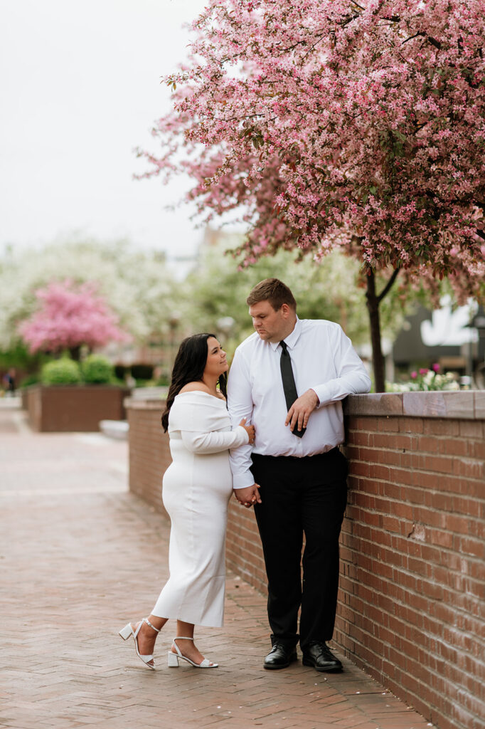 Couple posing outside for their formal South Bend engagement photos