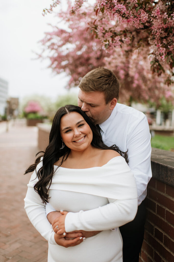 Couple posing outside for their formal South Bend engagement photos