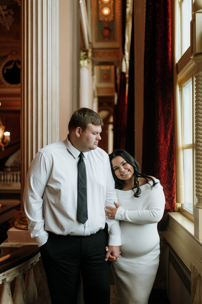 Couple posing for their South Bend engagement photos at Morris Performing Arts Center 