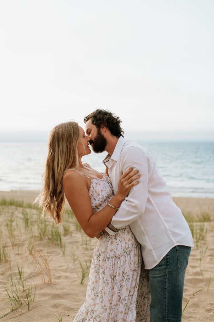 Couple kissing on the beach