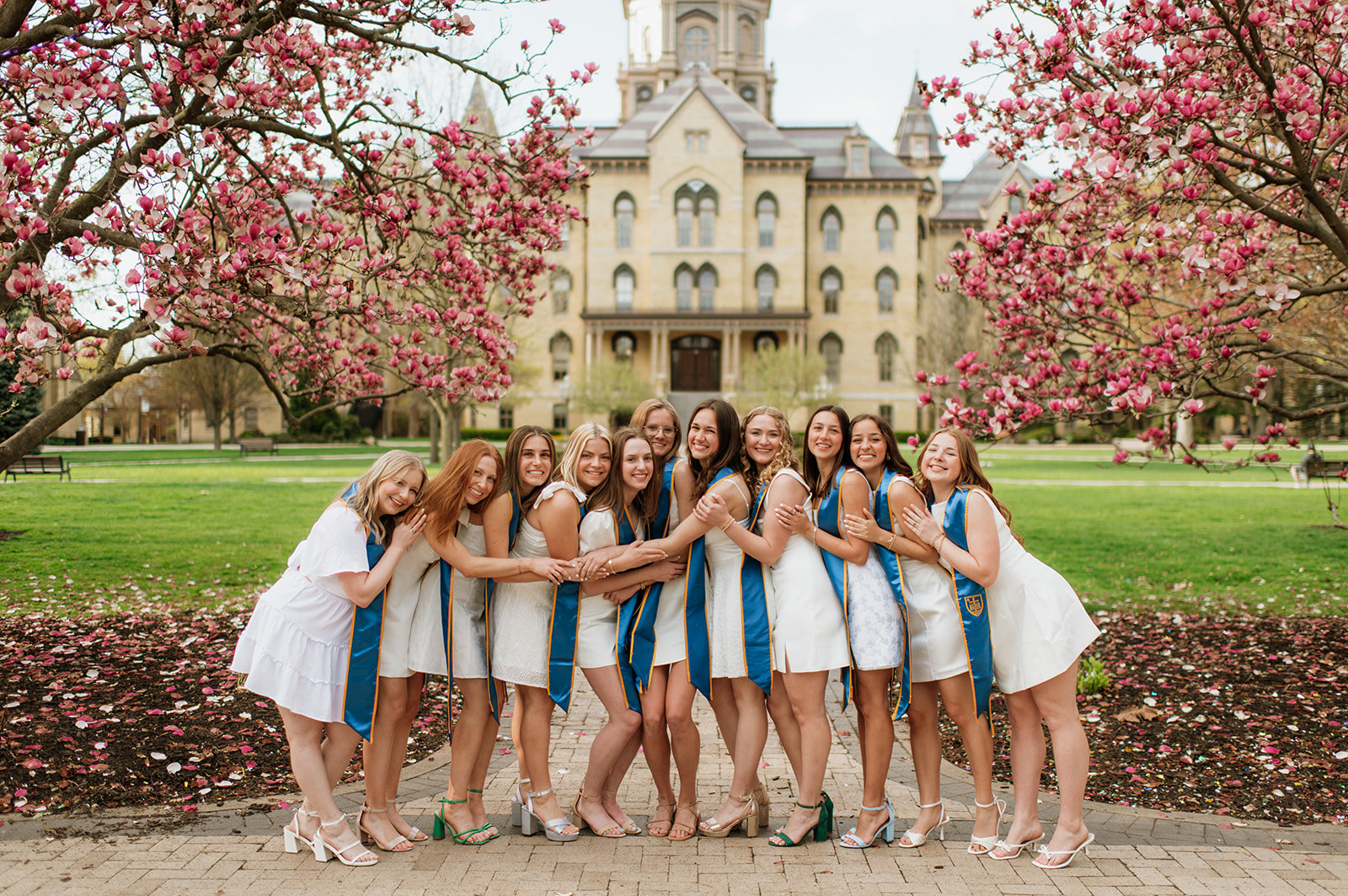 University of Notre Dame grad photos in front of The Golden Dome