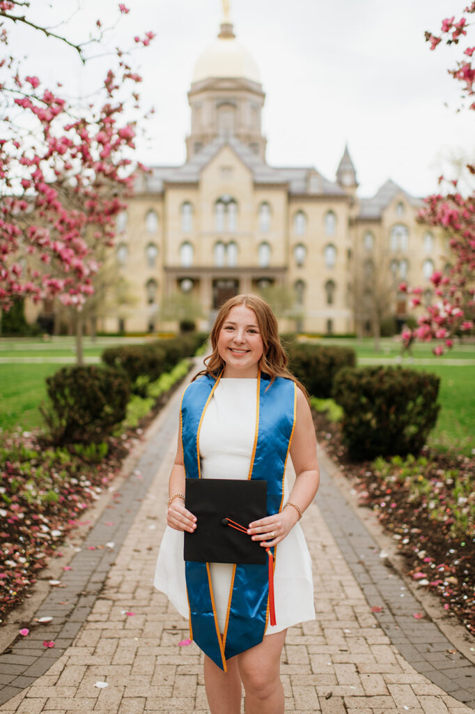 University of Notre Dame grad photos in front of The Golden Dome