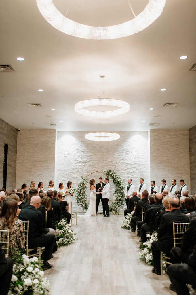 Indoor winter wedding ceremony at Allure on The Lake in Chesterton, Indiana