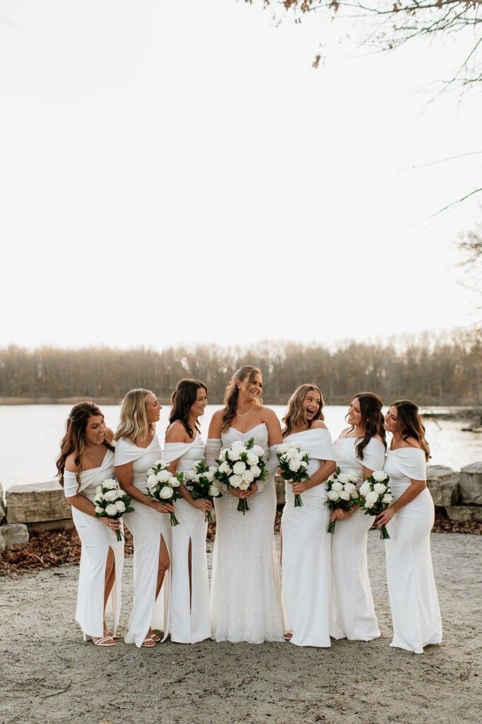 Outdoor bride and bridesmaids photos from a winter wedding at The Allure on The Lake in Chesterton, Indiana
