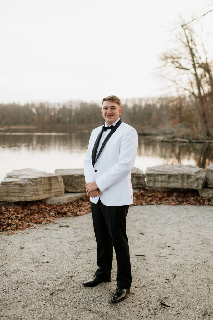 Outdoor grooms portraits from a winter Allure on The Lake wedding