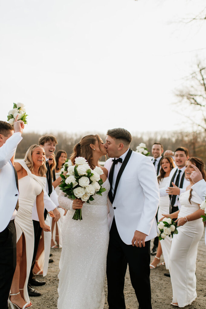 Outdoor wedding party photos from a winter wedding at The Allure on The Lake in Chesterton, Indiana