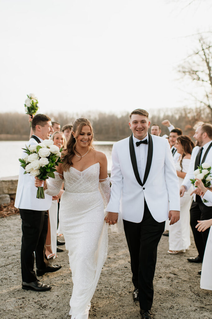 Outdoor wedding party photos from a winter wedding at The Allure on The Lake in Chesterton, Indiana