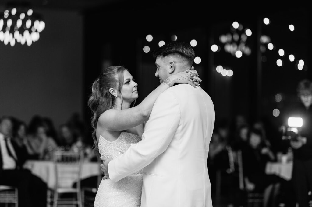 Bride and groom sharing their first dance during their Allure on The Lake wedding reception