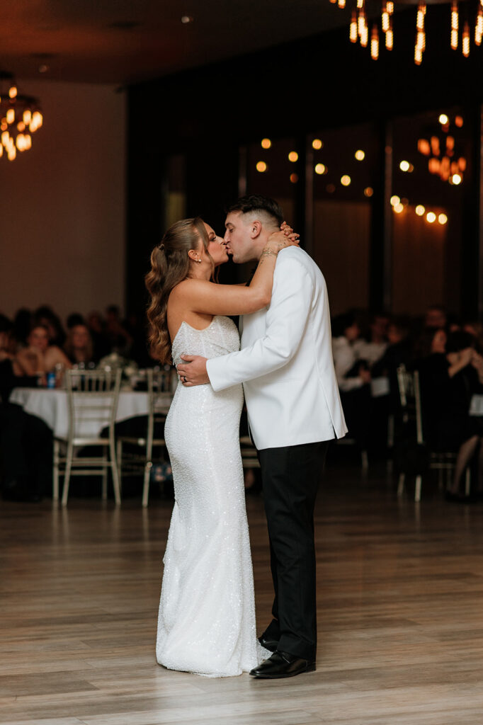Bride and groom sharing their first dance during their Allure on The Lake wedding reception
