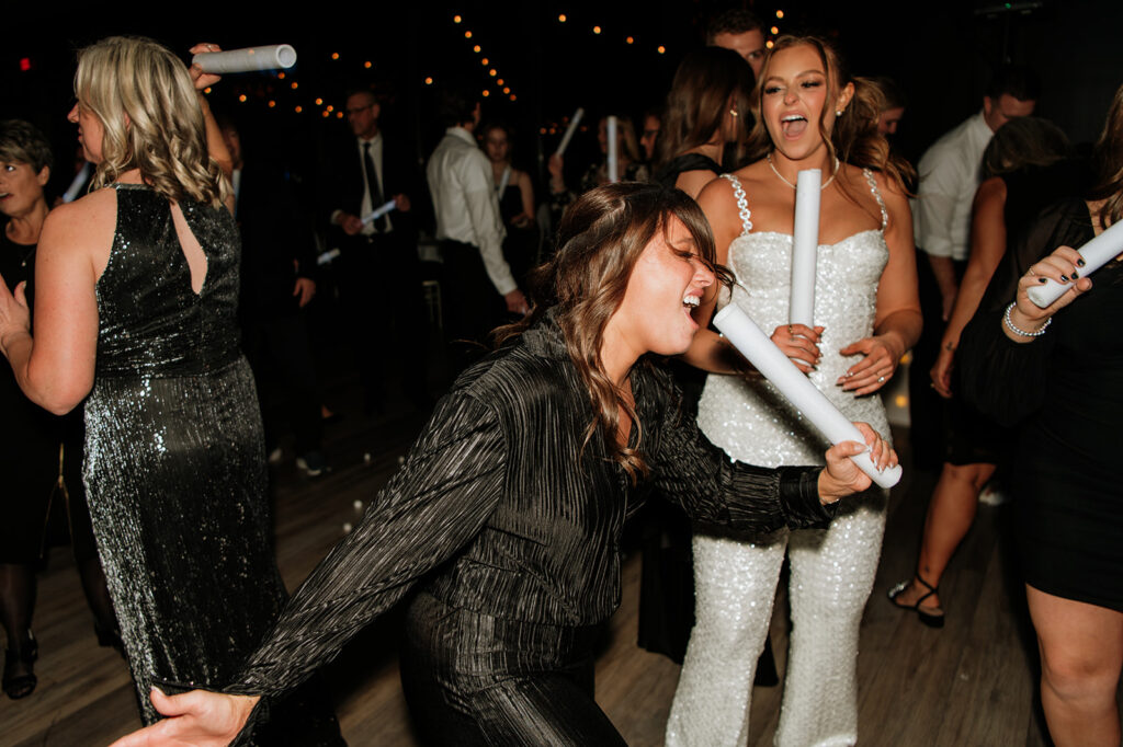 Wedding guests dancing during the reception