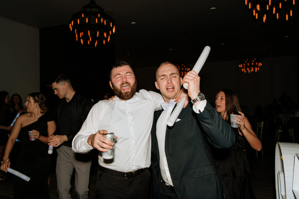 Wedding guests dancing during the reception