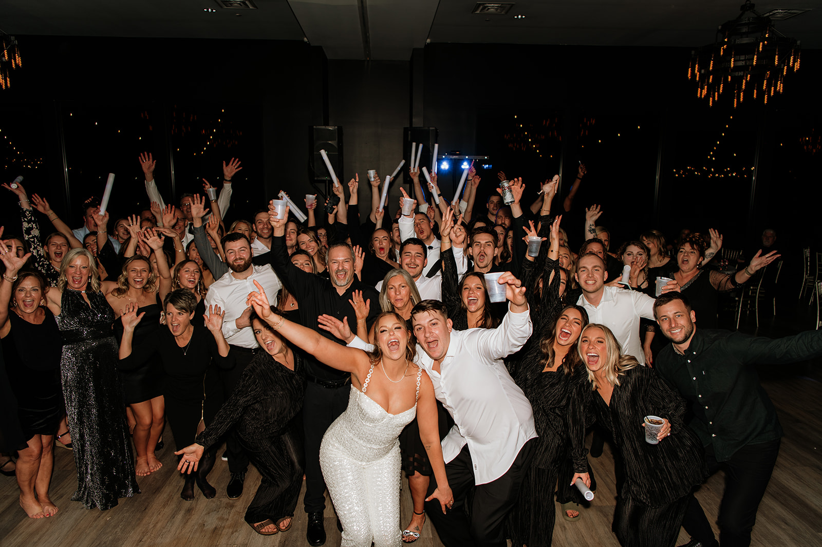 Bride and grooms large group shot from their wedding reception
