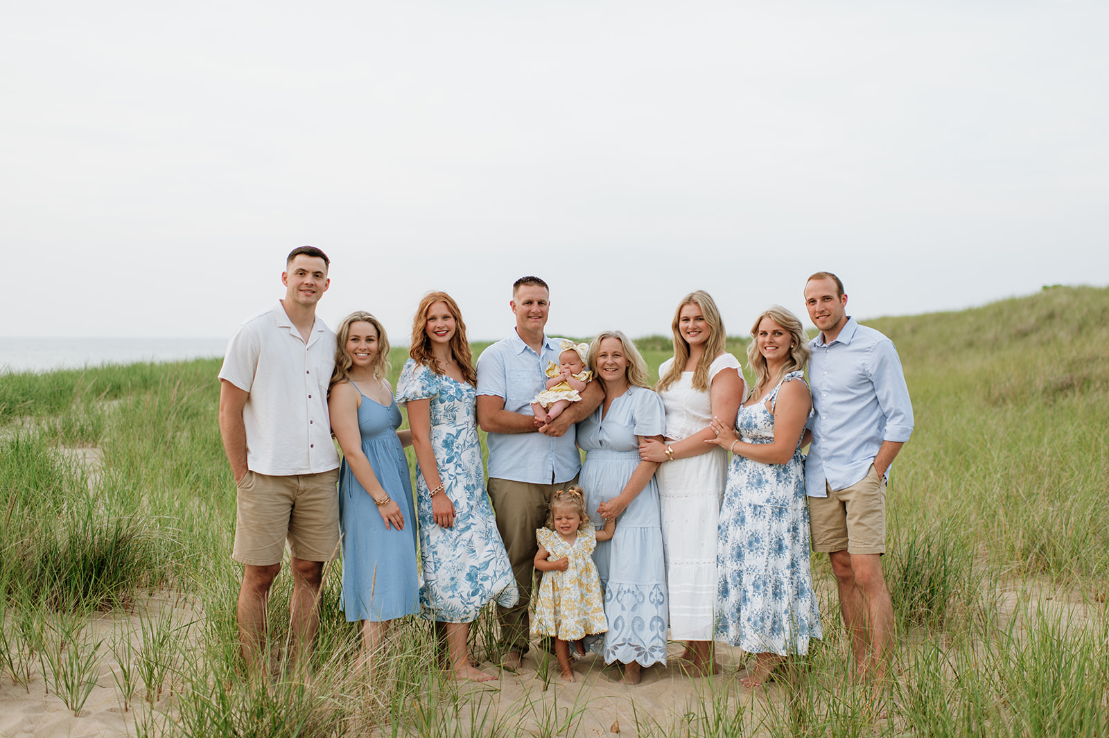 Outdoor beach extended family photoshoot at New Buffalo Beach in Michigan