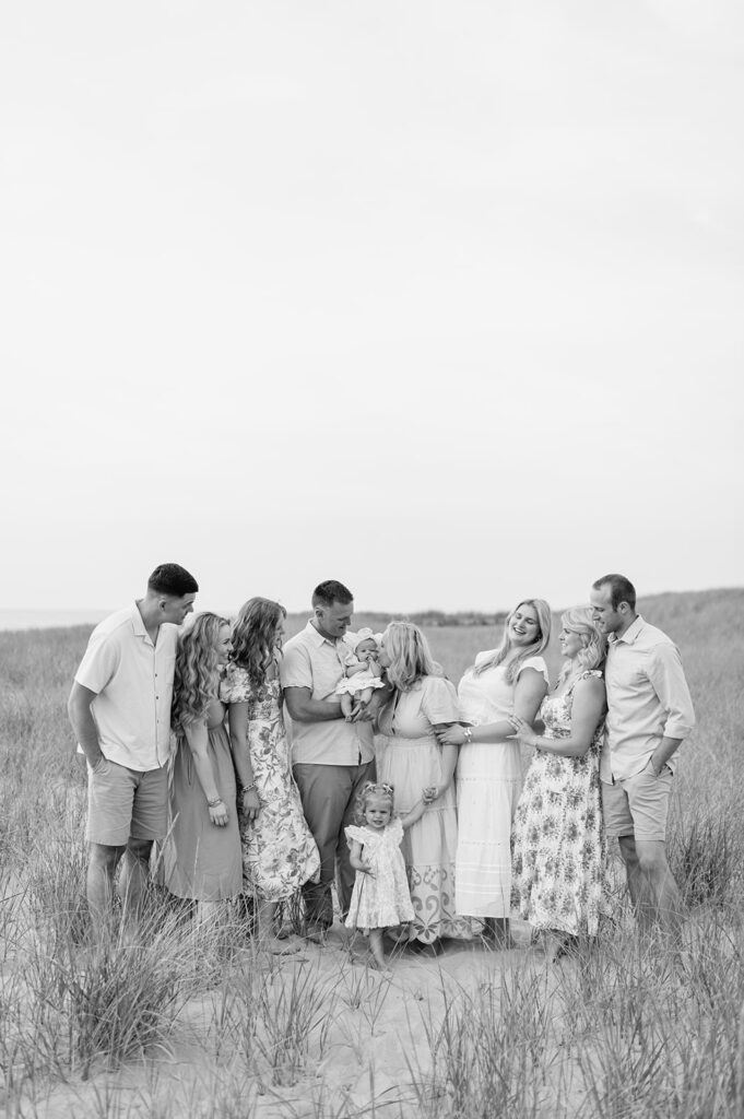 Black and white photo from an outdoor beach extended family photoshoot at New Buffalo Beach in Michigan