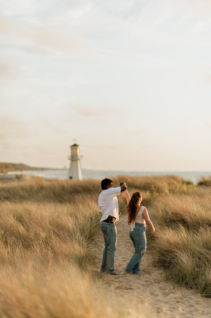 Couple dancing on the beach in New Buffalo, Michigan