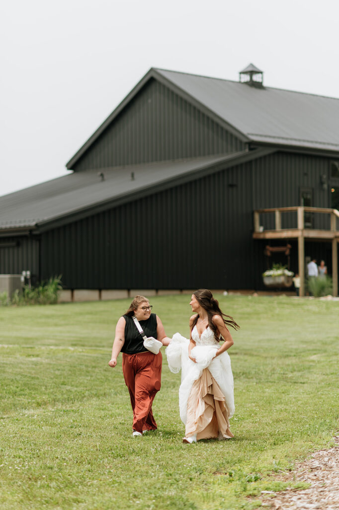 Bride and friend running to do a first look with the groom