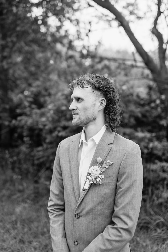 Black and white outdoor grooms portrait