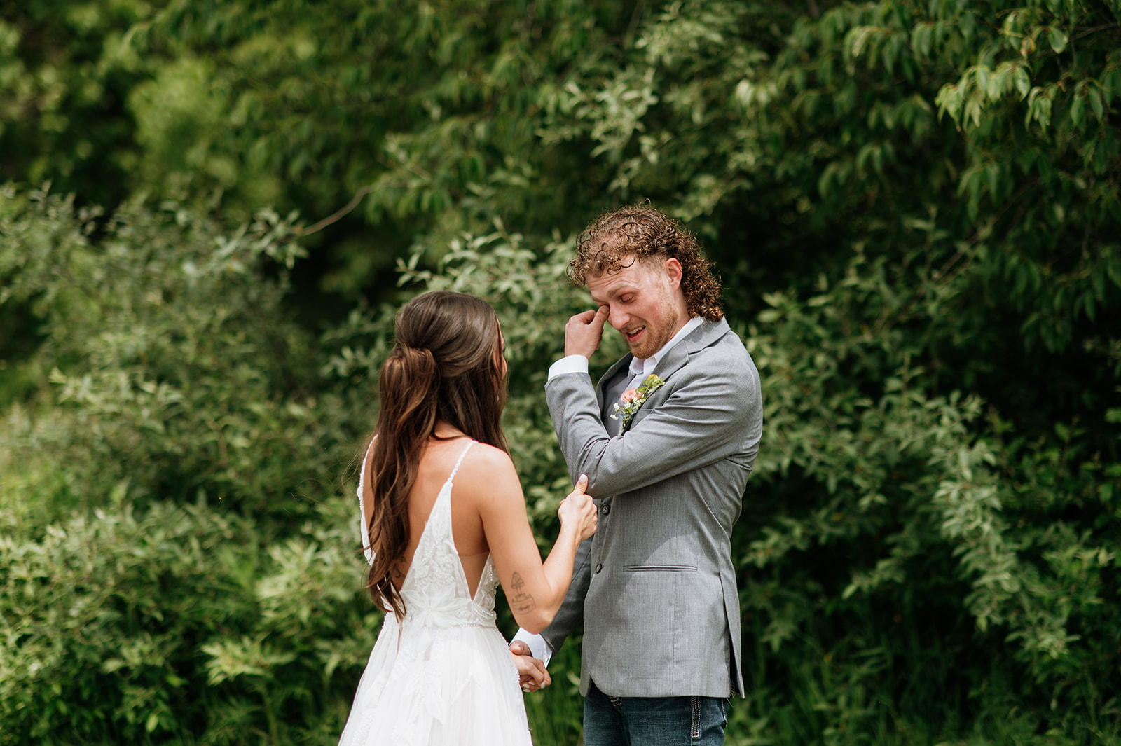 Groom getting emotional after seeing his bride during their first look