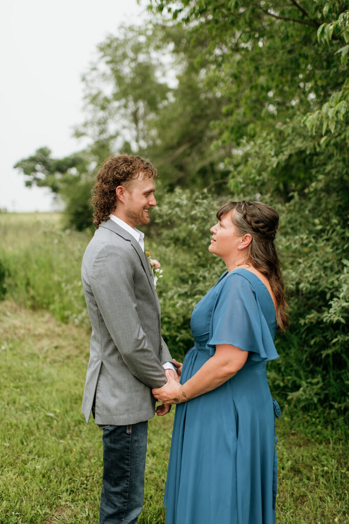 Groom and his mother sharing a moment before his wedding