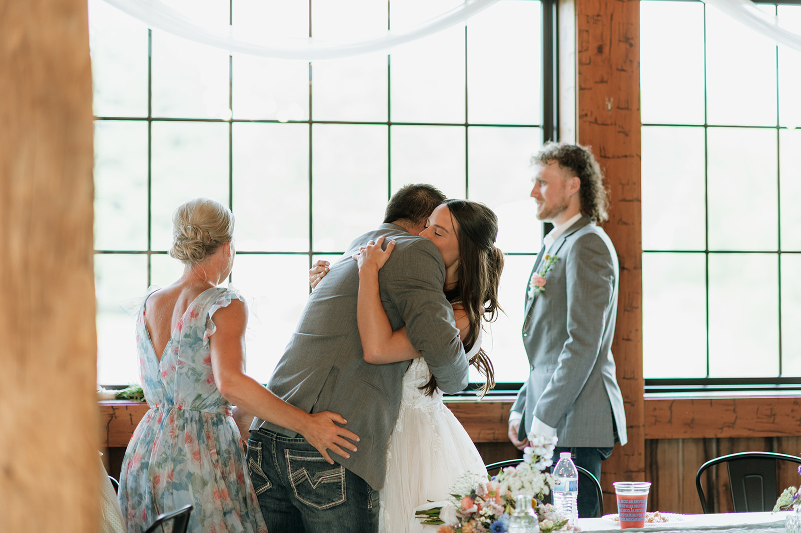 Bride hugging her father