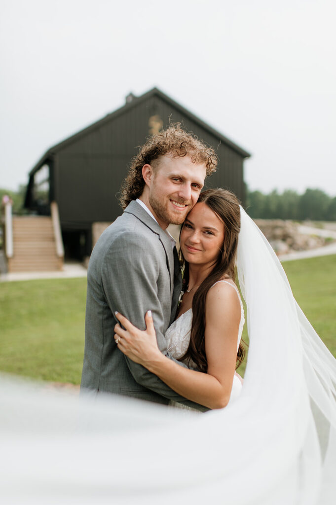 Bride and grooms outdoor wedding portraits at 5C Farms - Premier Indiana barn wedding venue