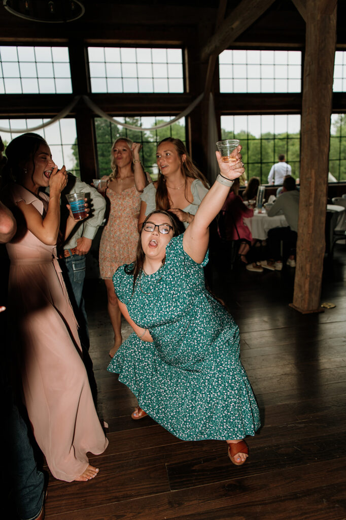 Wedding guest dancing during the reception 