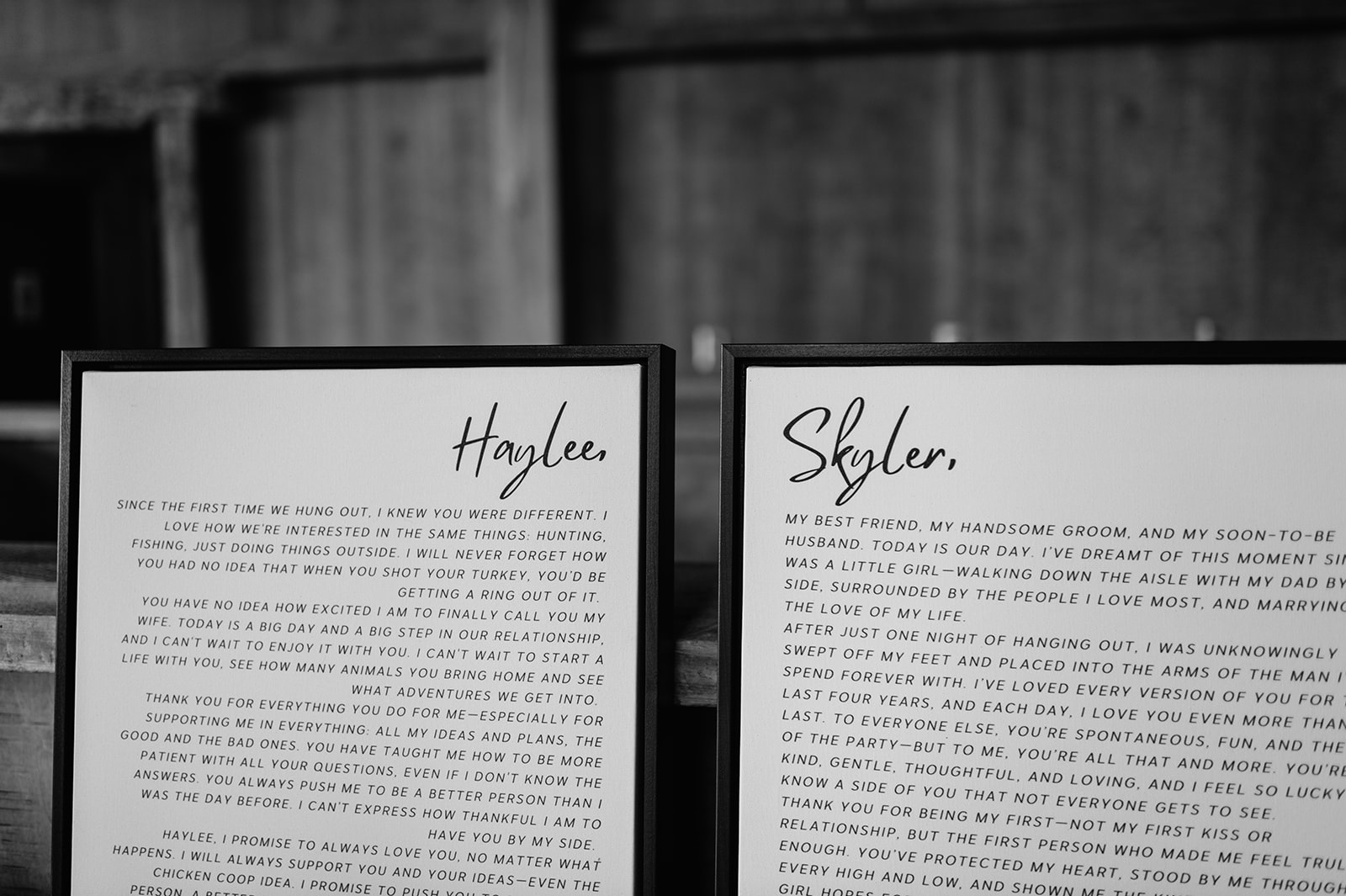 Black and white photo of framed notes that the bride and groom wrote to one another