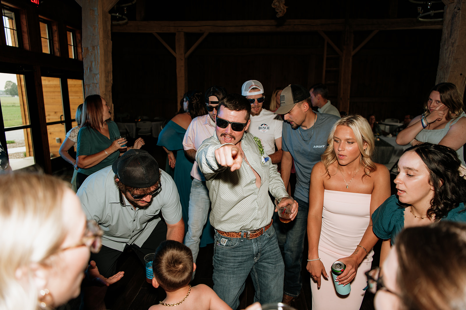 Wedding guests dancing during the reception
