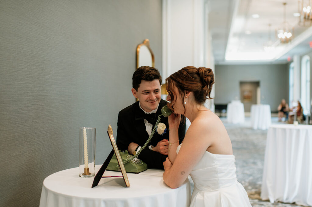 Bride and groom leaving a voice message on their audio guest book