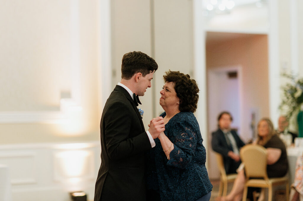 Groom dancing with his mother