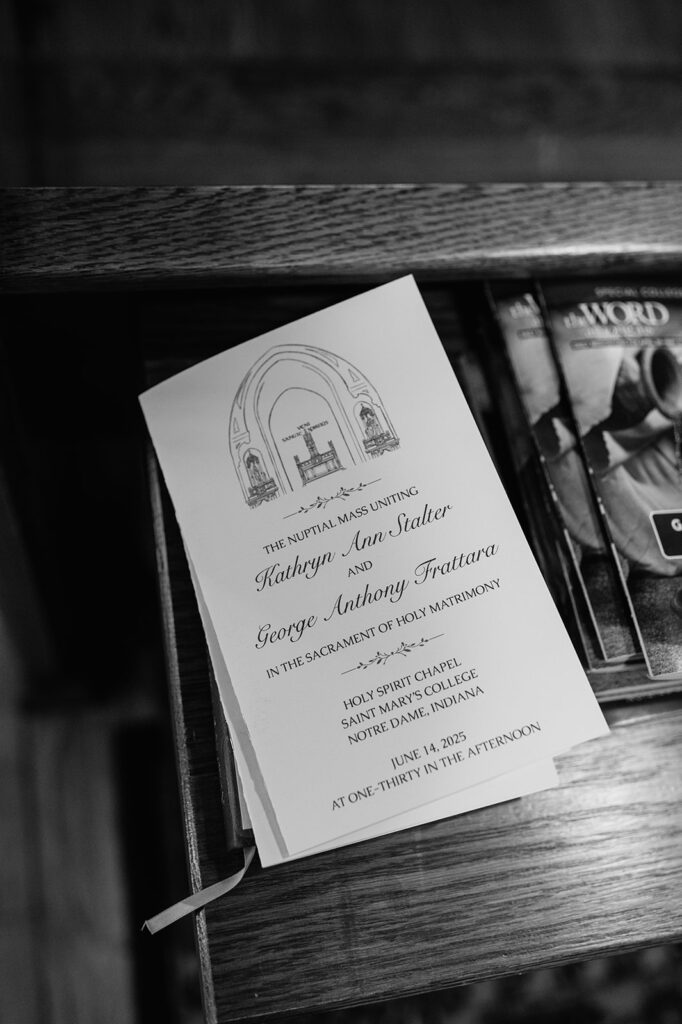 Close-up of wedding program for a Catholic nuptial mass at The Holy Spirit Chapel, Notre Dame.