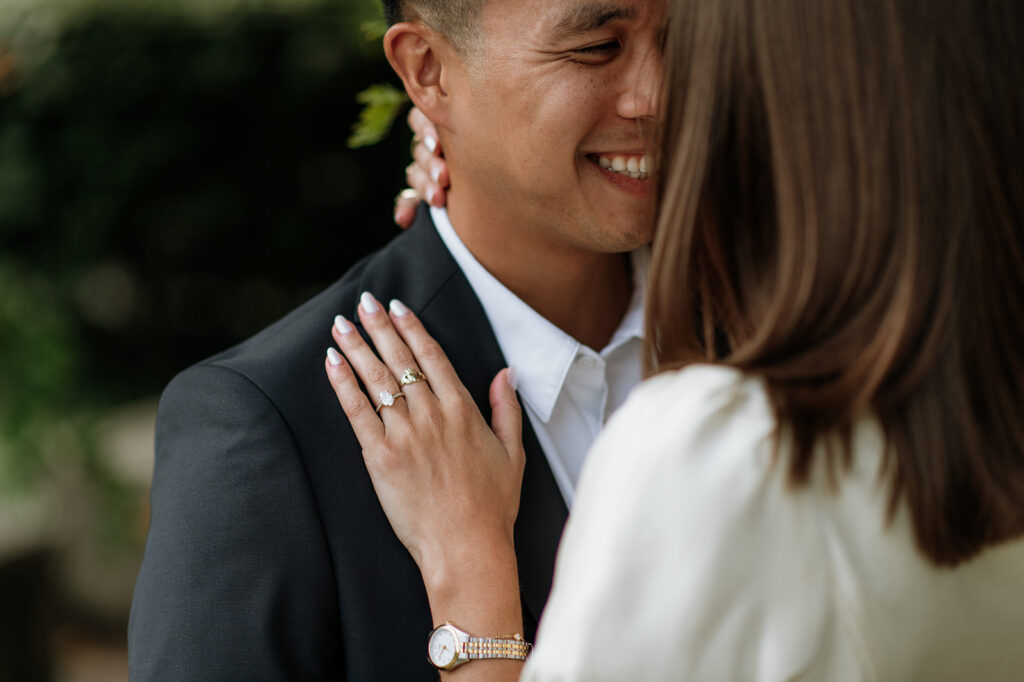 Close up shot of a couple posing for their Notre Dame engagement photos