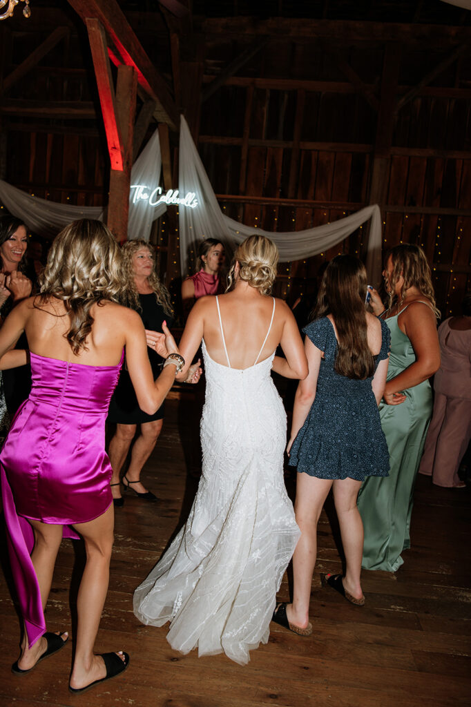 Bride dancing with guests